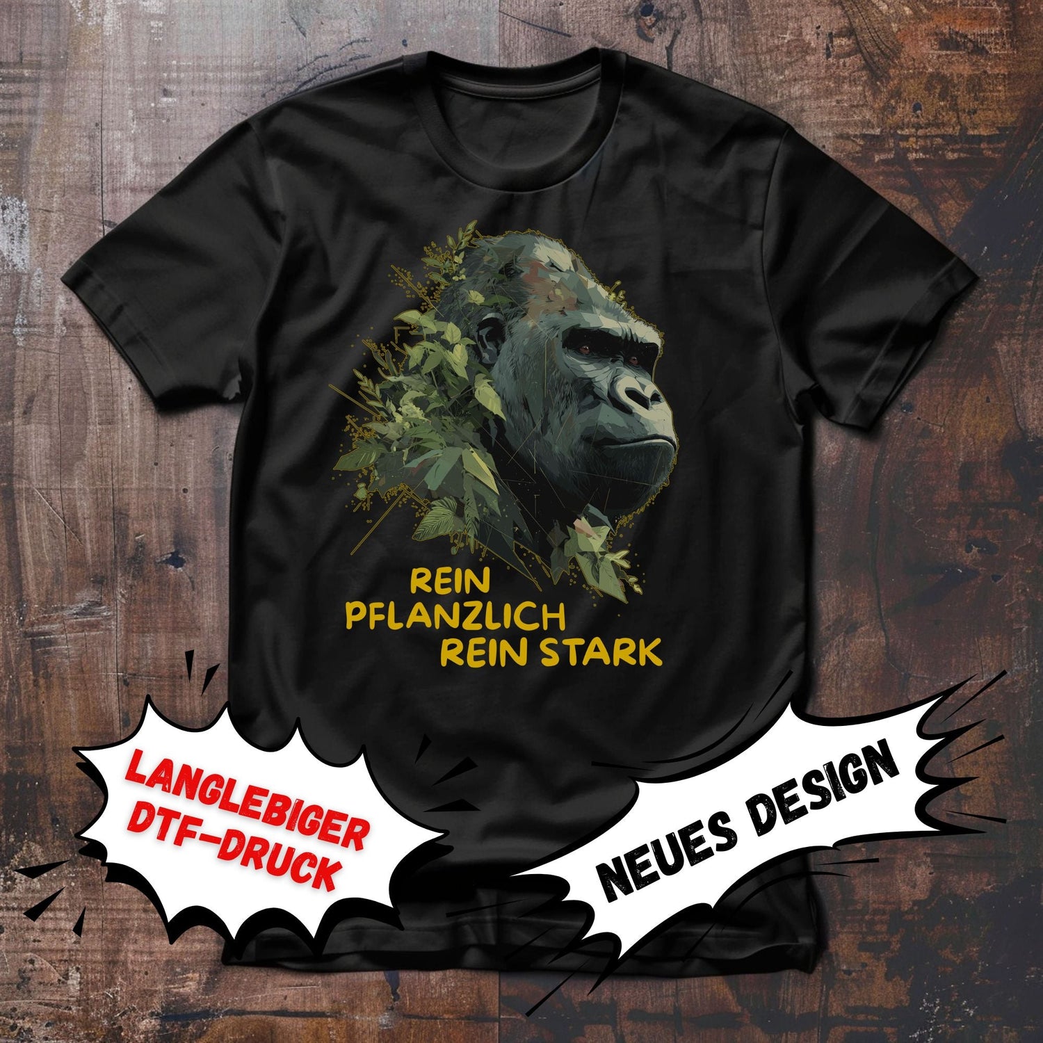 Schwarzes, veganes T-Shirt aus Bio Baumwolle mit Aufdruck. Ausdruckstarker Kopf eines Gorillas in dunklen Grüntönen. Das Fell geht in grüne Blätter über. Slogan "Rein pflanzlich rein stark". Langlebiger dtf-Druck