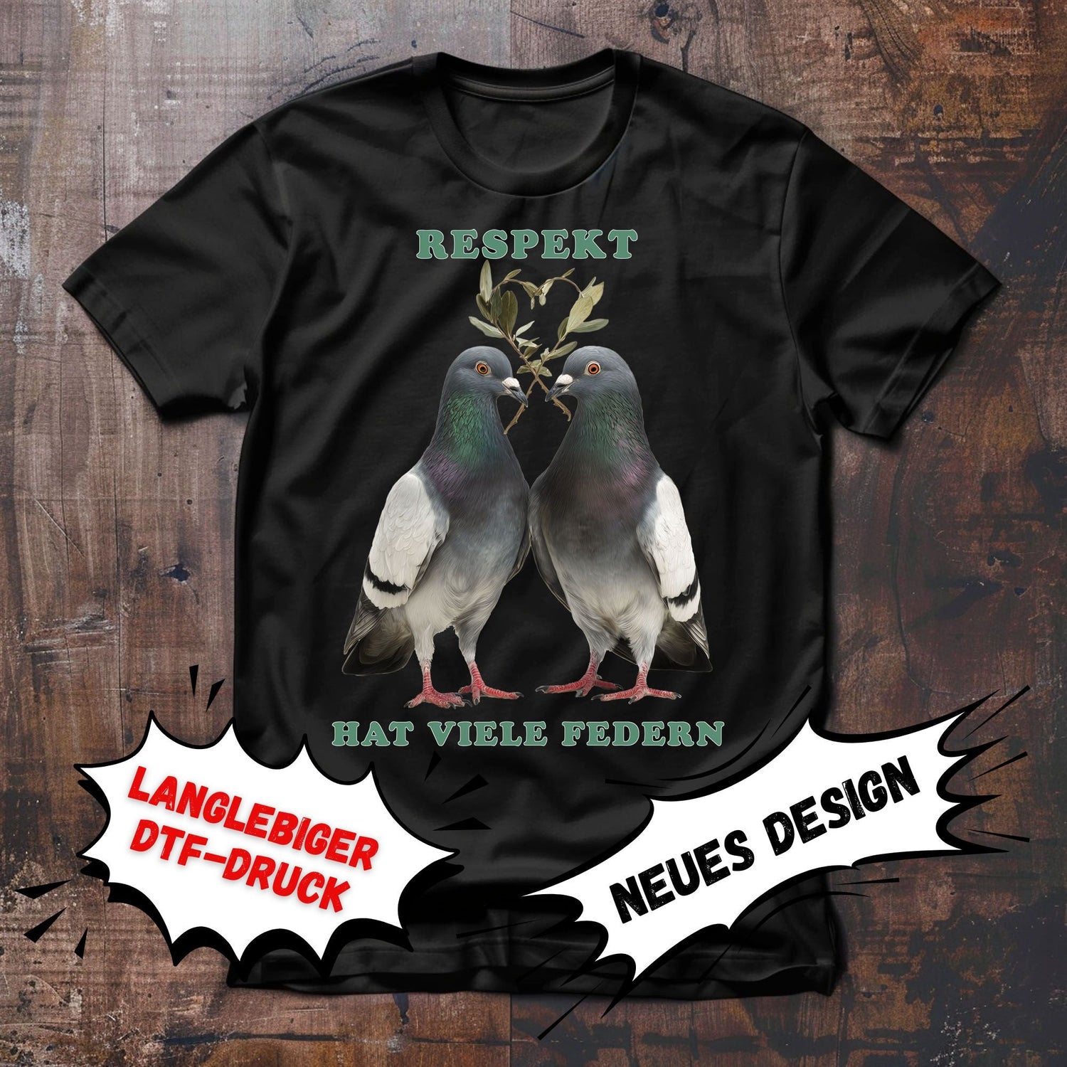 Schwarzes T-Shirt mit zwei Stadttauben, die einen zu einem Herz geformten Olivenzweig im Schnabel halten. Text Respekt hat viele Federn.